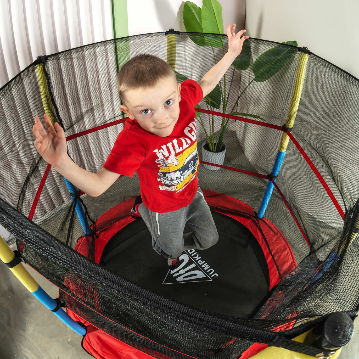 Батут DFC JUMP KIDS 55" красный с желто-синими стойками